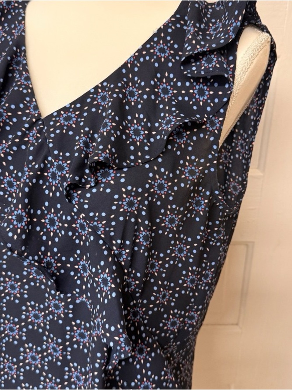 Sleeveless Navy Floral Ruffle V-Neck Top